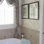 Master Bathroom With French Motif Wallpaper and Swag Window Treatment