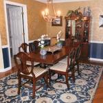 Beautiful Blue and Gold Dining Room in Newly Decorated Condo